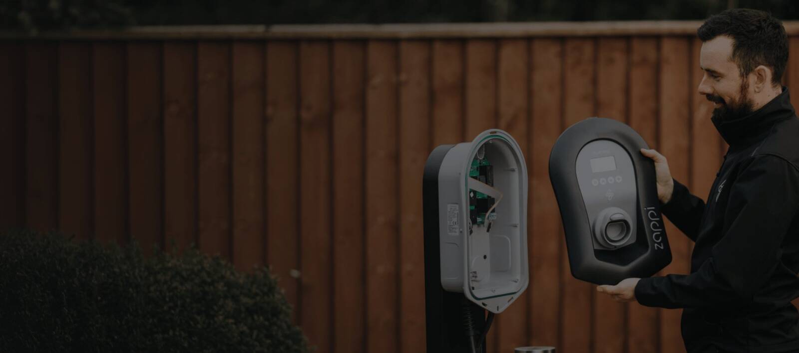 myenergi Zappi 7 kW EV charger installed on a garage wall