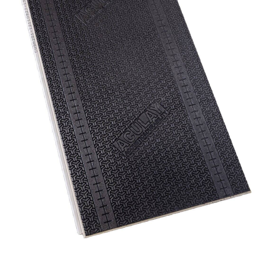 Acoustic backing layer of the vinyl floor, showing sound-dampening foam underlay