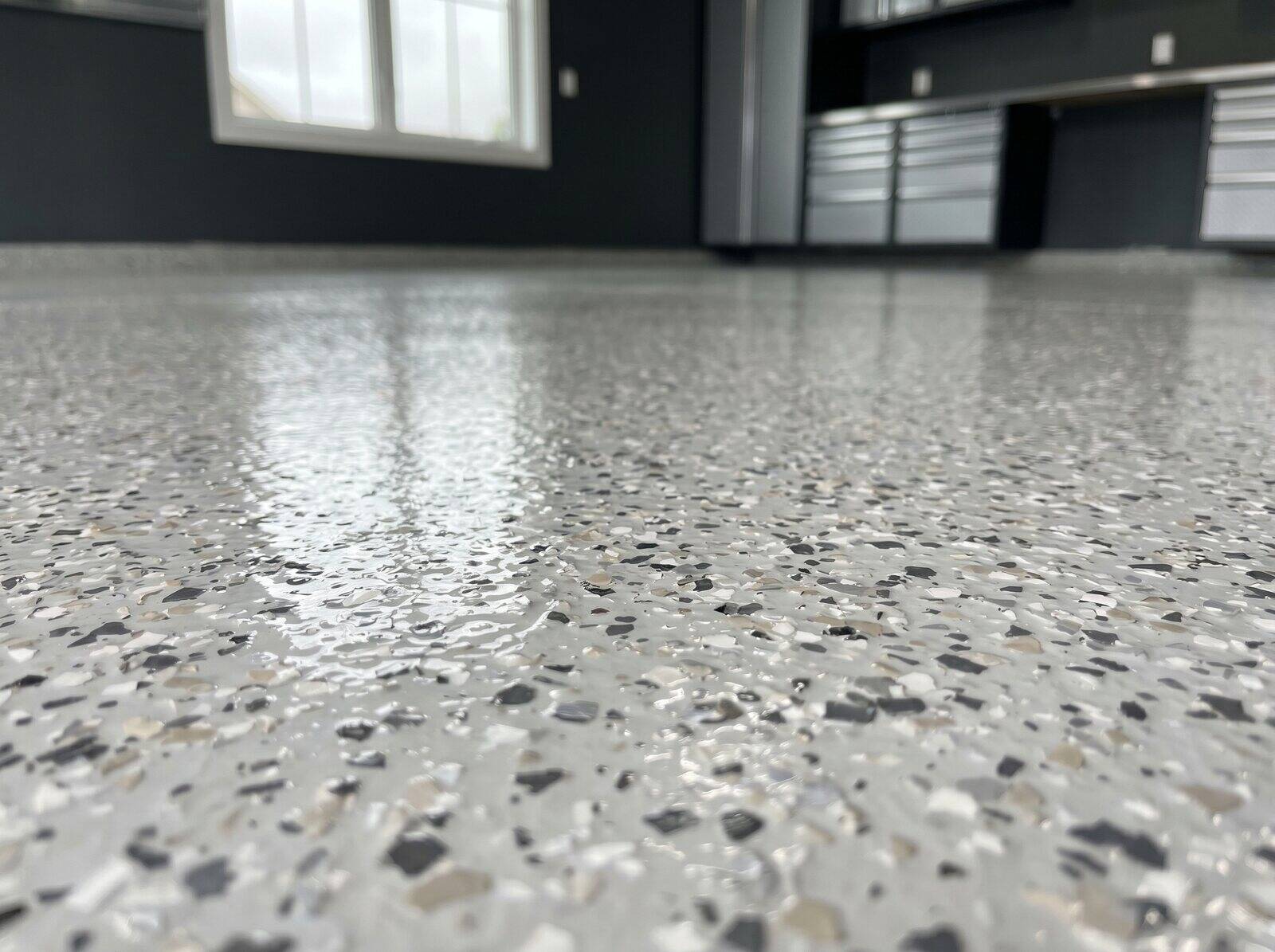 Professional resin flake garage floor, close-up detail